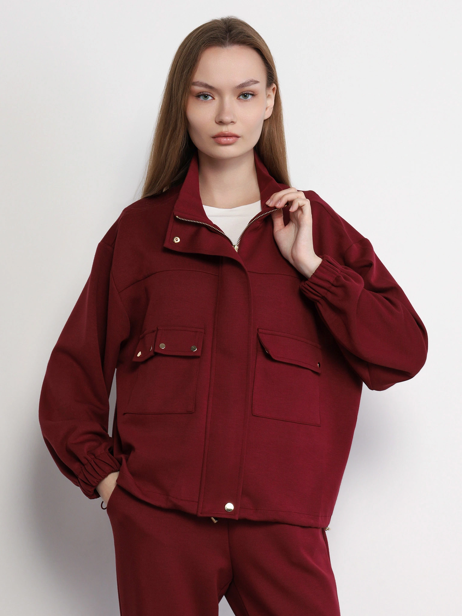 Куртка трикотажная бордового цвета с кулиской по низу